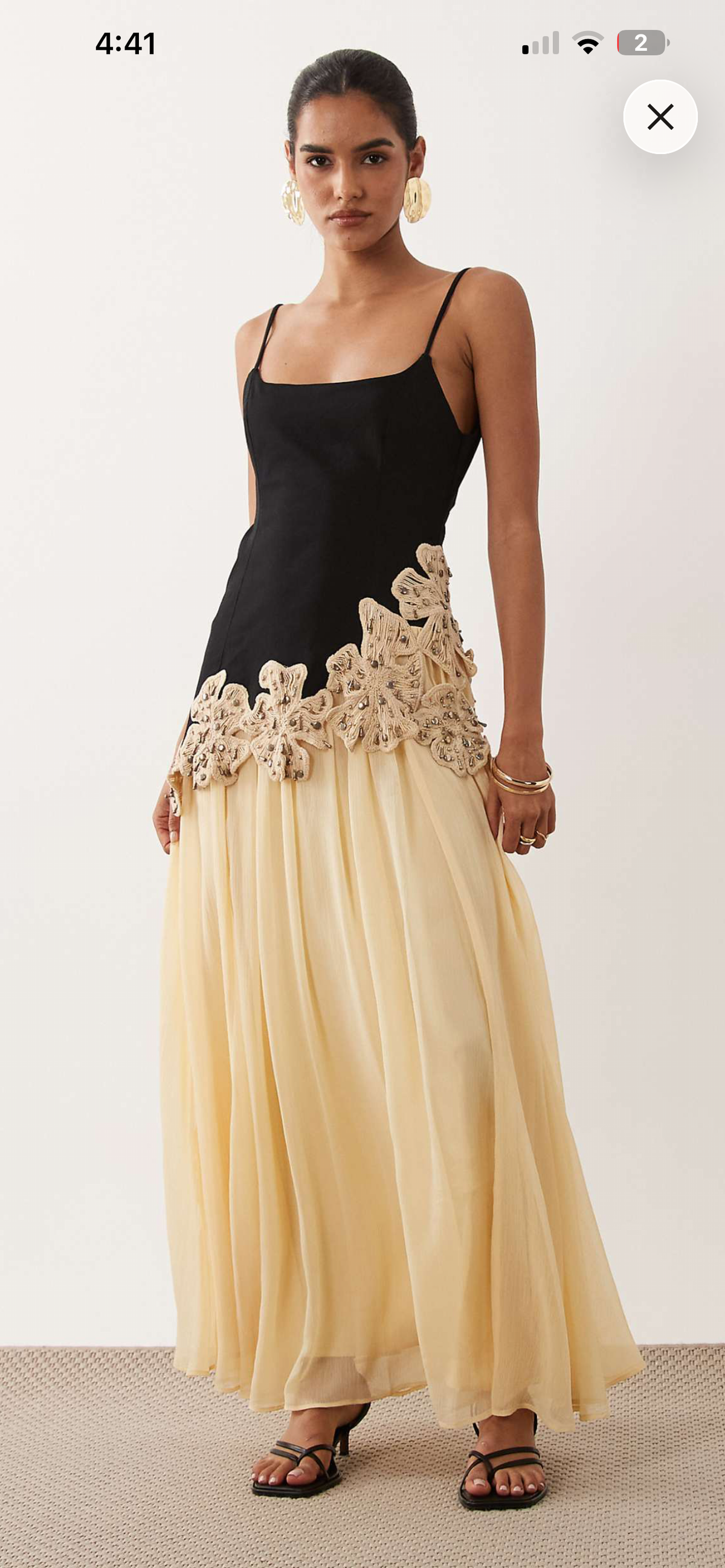 Black butter with embellished crochet flowers