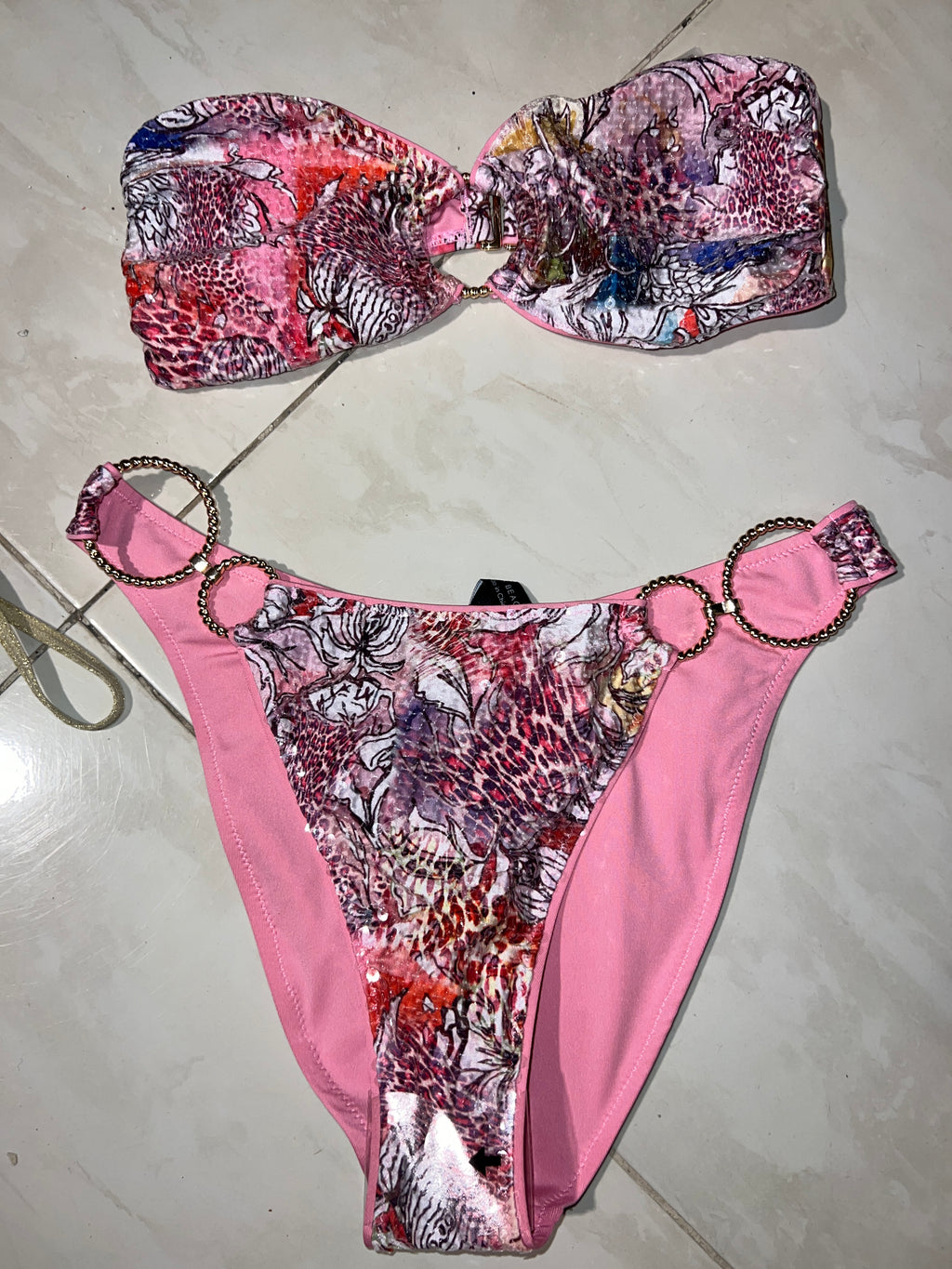 Animal print with gold circles in pink bikini