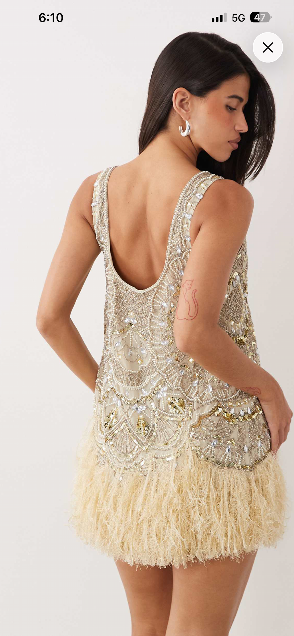 Scoop neck feather embellished dress in pale yellow