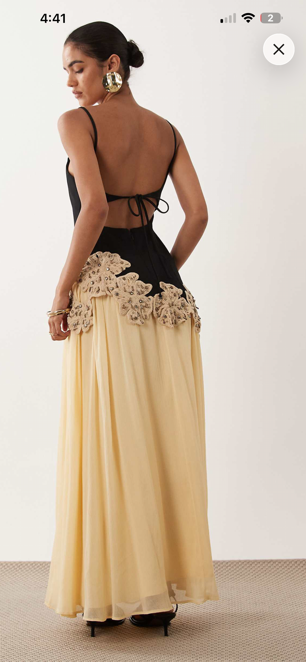 Black butter with embellished crochet flowers